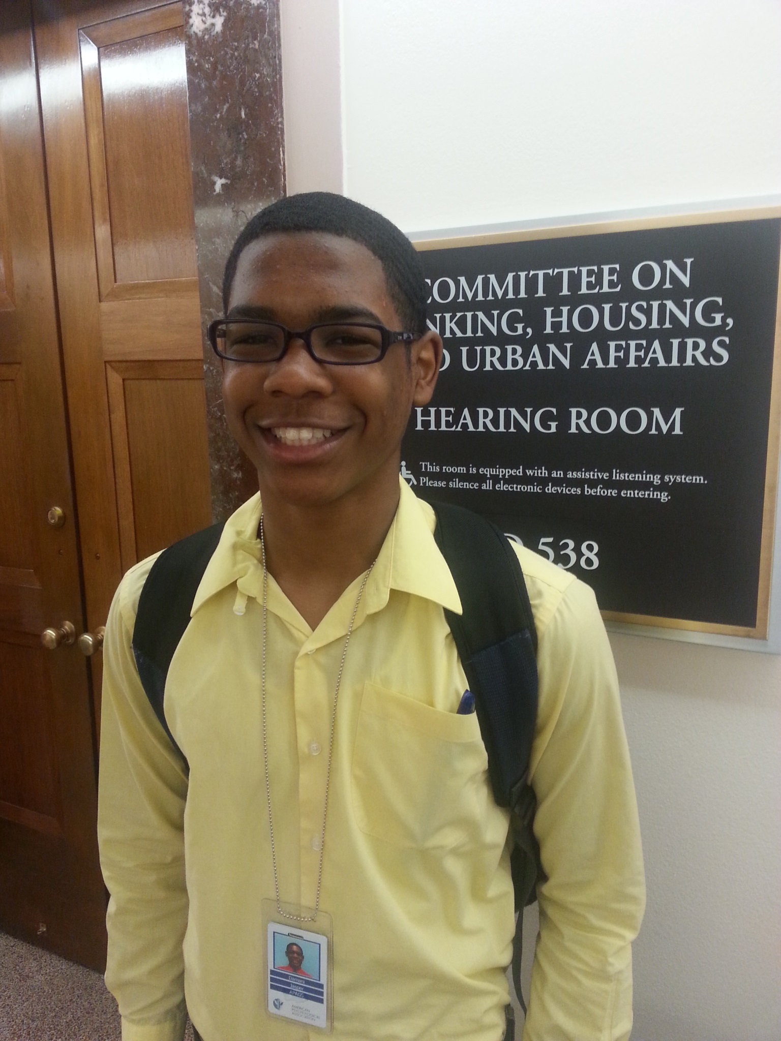 APAGS High School Fellow Damani Jasper outside of a Senate hearing on student debt. 